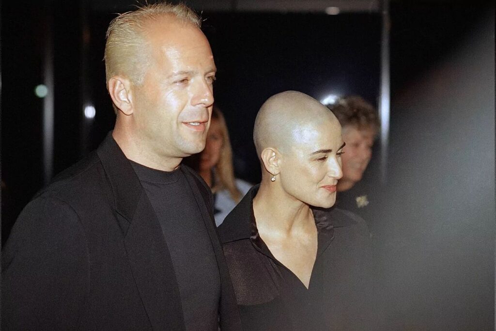 Bruce Willis having a rough time as Demi Moore moves next to him until the very end